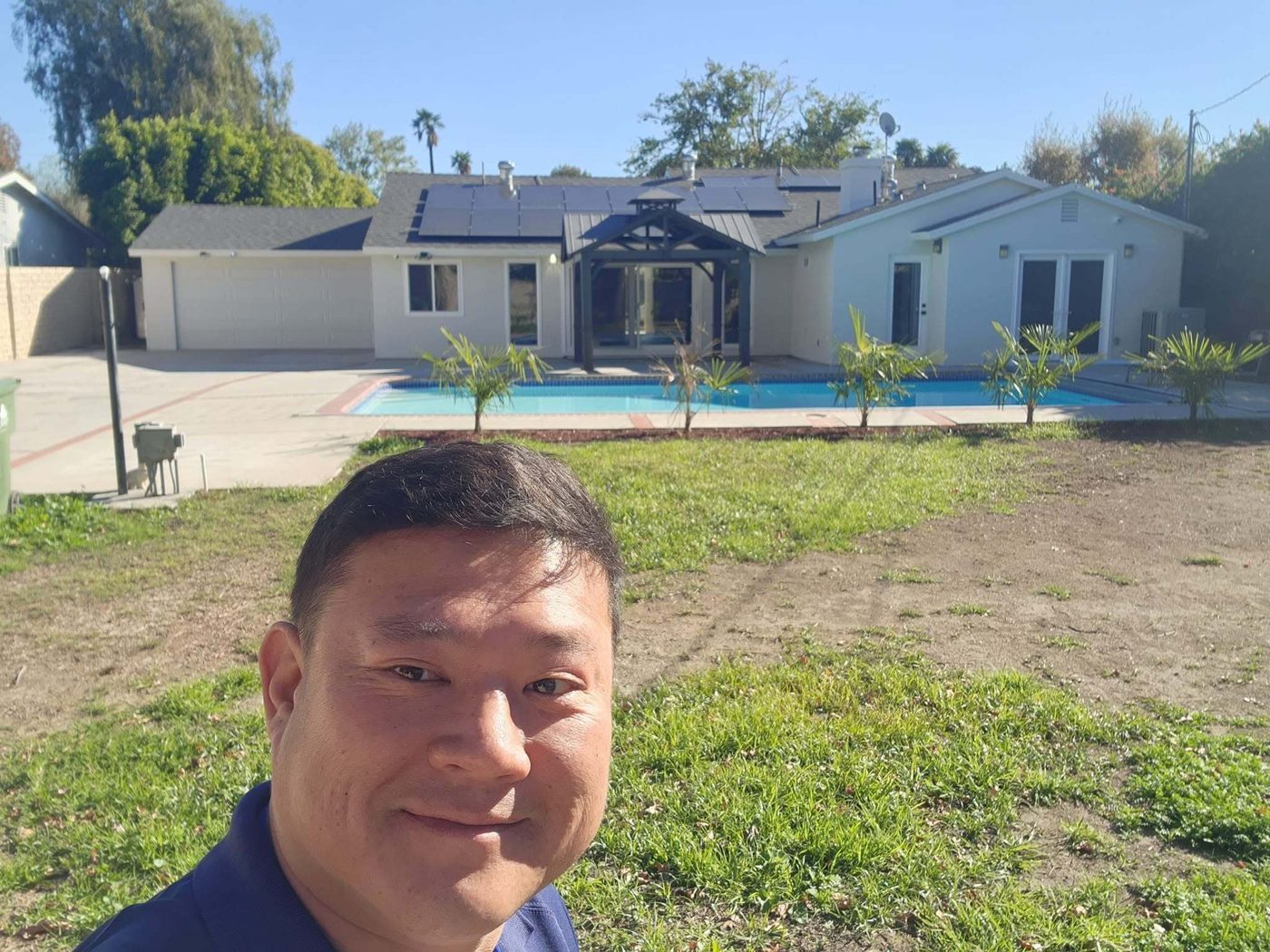 Roof work on a solar-equipped home with pool